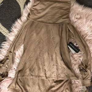 Light tan colored long sleeve blouse